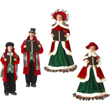 Green red christmas caroler figures