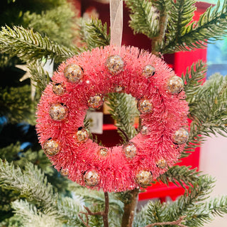 Pink Beaded Bottlebrush Wreath Ornament on tree