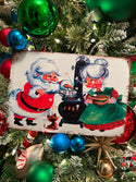 Retro Santa & Mrs. Claus Making Popcorn Metal Sign on tree