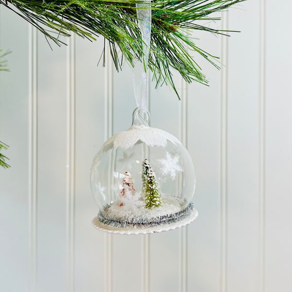 pastel bottlebrush forest snow globe ornament